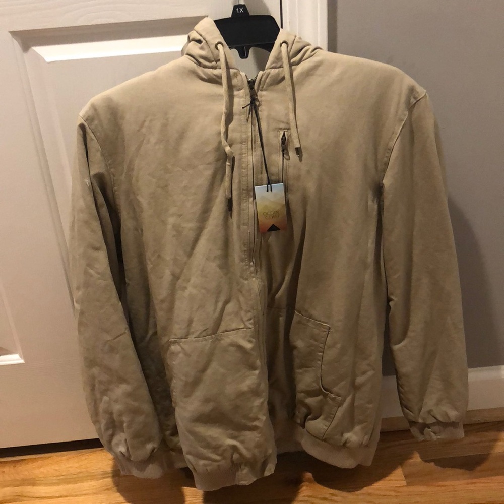 Ocean and coast. Brand new with tags, mens size large